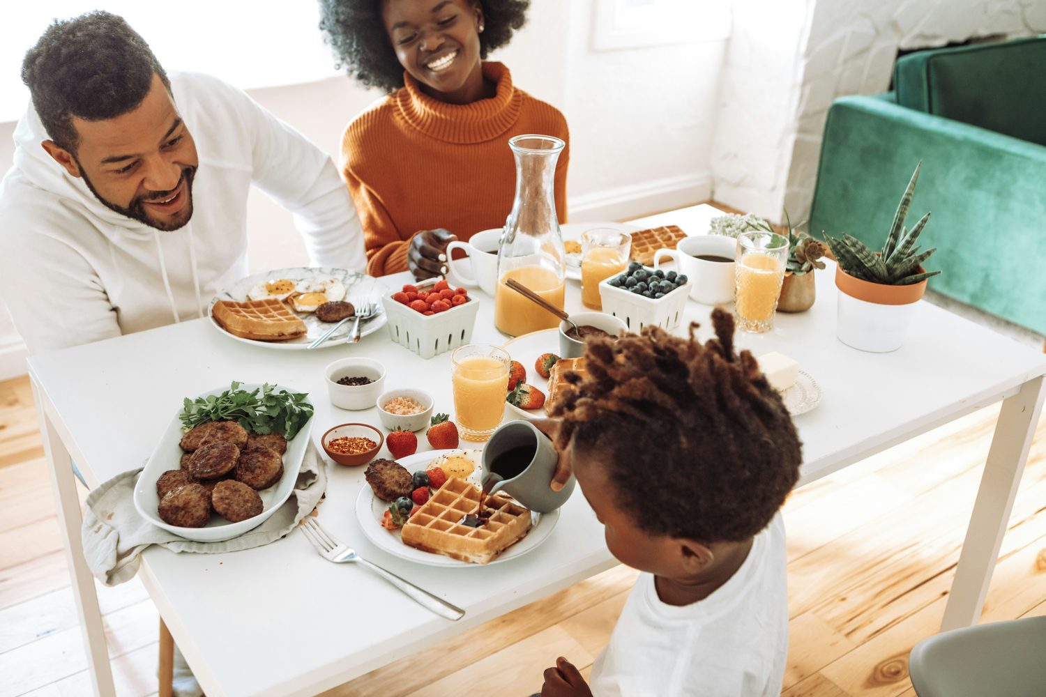 A family relaxed and at ease together in their home